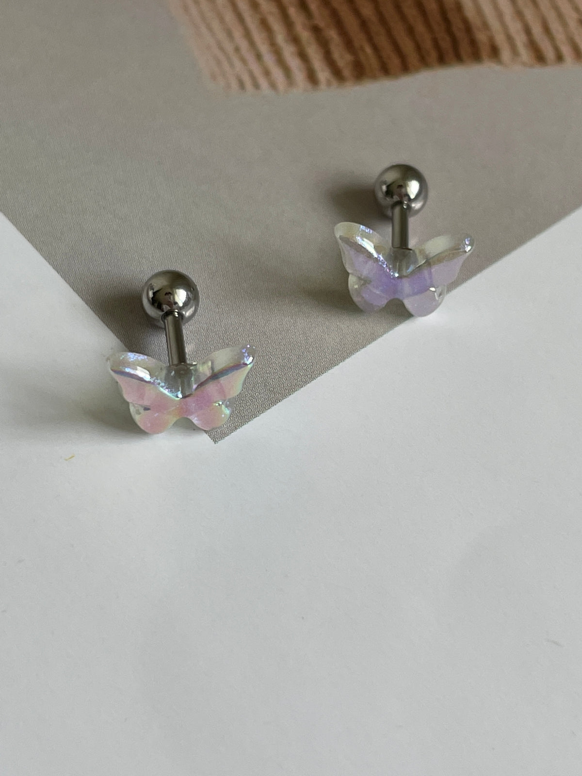 Galaxy butterfly piercing